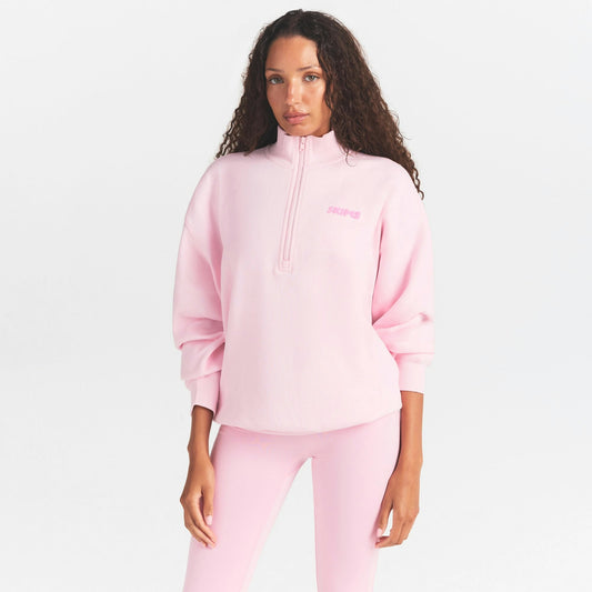 mock neck quarter zip with embossed logo