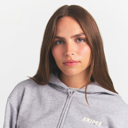 zip up hoodie with embossed logo